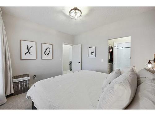 104 Silverado Plains Park Sw, Calgary, AB - Indoor Photo Showing Bedroom