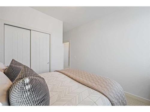 104 Silverado Plains Park Sw, Calgary, AB - Indoor Photo Showing Bedroom