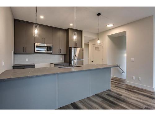 259 Royal Elm Road Nw, Calgary, AB - Indoor Photo Showing Kitchen With Upgraded Kitchen