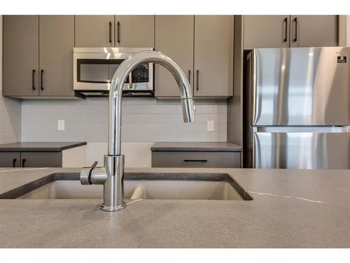 259 Royal Elm Road Nw, Calgary, AB - Indoor Photo Showing Kitchen With Double Sink With Upgraded Kitchen