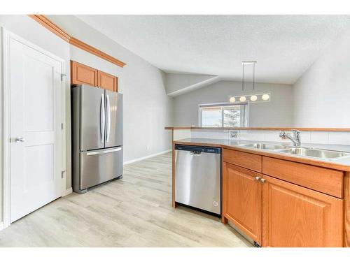 1275 Strathcona Road, Strathmore, AB - Indoor Photo Showing Kitchen With Double Sink