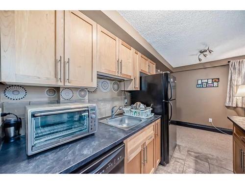 104-620 15 Avenue Sw, Calgary, AB - Indoor Photo Showing Kitchen