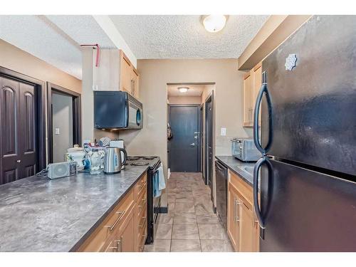 104-620 15 Avenue Sw, Calgary, AB - Indoor Photo Showing Kitchen