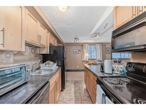 104-620 15 Avenue Sw, Calgary, AB - Indoor Photo Showing Kitchen