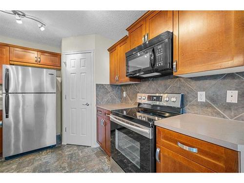 249 Evansmeade Point Nw, Calgary, AB - Indoor Photo Showing Kitchen