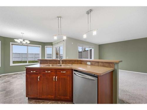 249 Evansmeade Point Nw, Calgary, AB - Indoor Photo Showing Kitchen With Double Sink