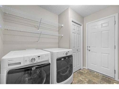 249 Evansmeade Point Nw, Calgary, AB - Indoor Photo Showing Laundry Room