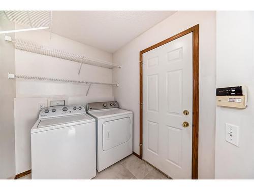 9 Harvest Park Place Ne, Calgary, AB - Indoor Photo Showing Laundry Room