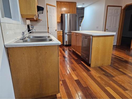 9 Harvest Park Place Ne, Calgary, AB - Indoor Photo Showing Kitchen With Double Sink