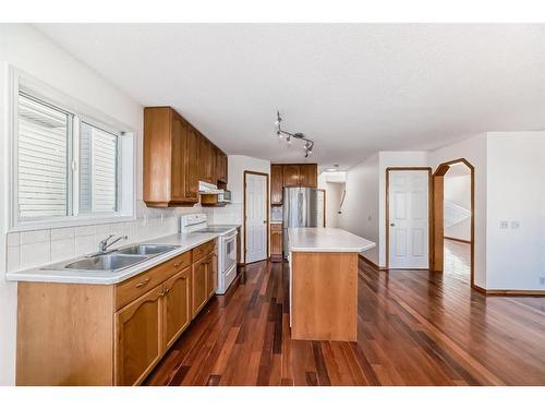 9 Harvest Park Place Ne, Calgary, AB - Indoor Photo Showing Kitchen With Double Sink