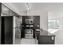 704-325 3 Street Se, Calgary, AB  - Indoor Photo Showing Kitchen 