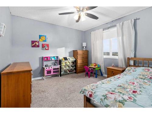 2352 Baywater Crescent Sw, Airdrie, AB - Indoor Photo Showing Bedroom