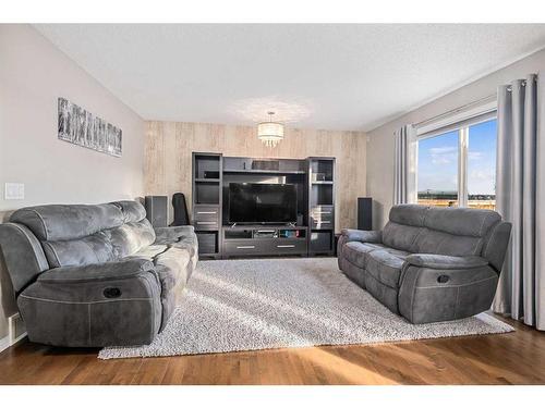 2352 Baywater Crescent Sw, Airdrie, AB - Indoor Photo Showing Living Room