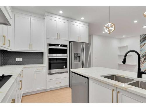 44 Auburn Glen Lane Se, Calgary, AB - Indoor Photo Showing Kitchen With Stainless Steel Kitchen With Double Sink With Upgraded Kitchen