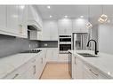 44 Auburn Glen Lane Se, Calgary, AB  - Indoor Photo Showing Kitchen With Stainless Steel Kitchen With Double Sink With Upgraded Kitchen 