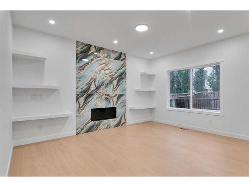 44 Auburn Glen Lane Se, Calgary, AB - Indoor With Fireplace