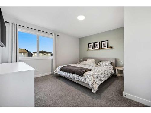 96 Magnolia Grove Se, Calgary, AB - Indoor Photo Showing Bedroom