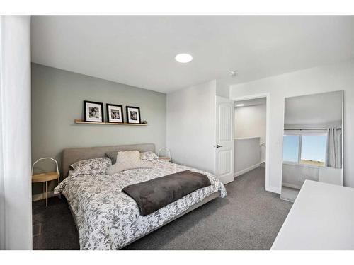 96 Magnolia Grove Se, Calgary, AB - Indoor Photo Showing Bedroom