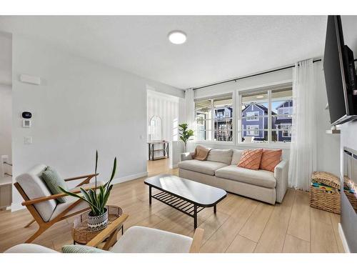 96 Magnolia Grove Se, Calgary, AB - Indoor Photo Showing Living Room