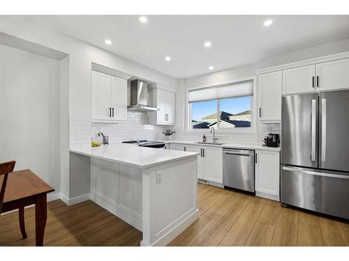 96 Magnolia Grove Se, Calgary, AB - Indoor Photo Showing Kitchen With Stainless Steel Kitchen With Upgraded Kitchen