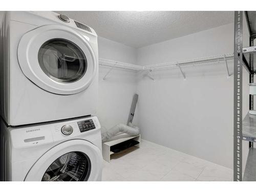 106-300 Harvest Hills Place Ne, Calgary, AB - Indoor Photo Showing Laundry Room