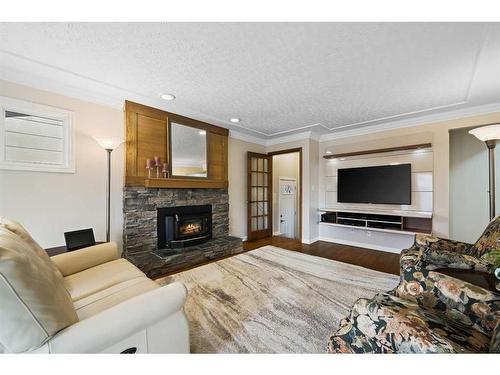 226 Midridge Crescent Se, Calgary, AB - Indoor Photo Showing Living Room With Fireplace