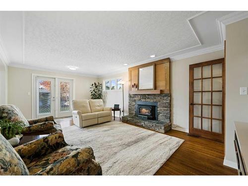 226 Midridge Crescent Se, Calgary, AB - Indoor Photo Showing Living Room With Fireplace