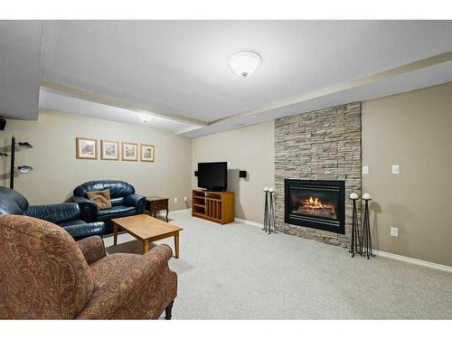 226 Midridge Crescent Se, Calgary, AB - Indoor Photo Showing Living Room With Fireplace