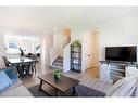 51 Magnolia Way Se, Calgary, AB  - Indoor Photo Showing Living Room 