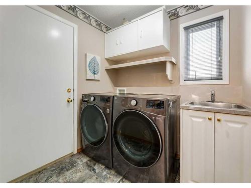 122 Douglasview Rise Se, Calgary, AB - Indoor Photo Showing Laundry Room