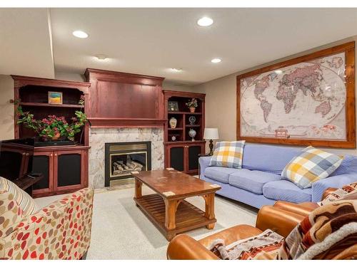 122 Douglasview Rise Se, Calgary, AB - Indoor Photo Showing Living Room With Fireplace