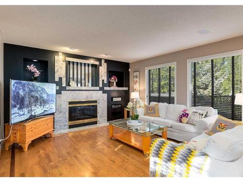 122 Douglasview Rise Se, Calgary, AB - Indoor Photo Showing Living Room With Fireplace