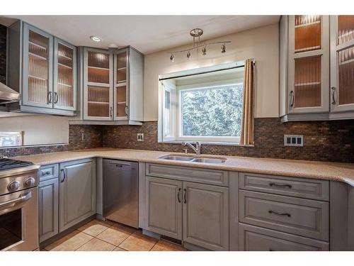 3235 Conrad Crescent Nw, Calgary, AB - Indoor Photo Showing Kitchen With Double Sink