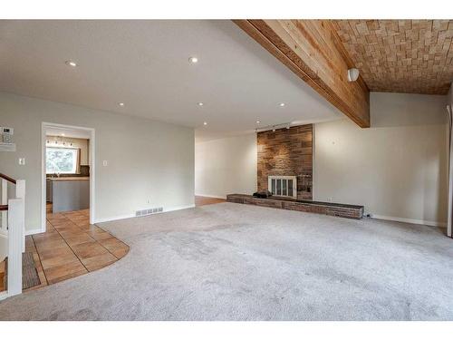 3235 Conrad Crescent Nw, Calgary, AB - Indoor With Fireplace