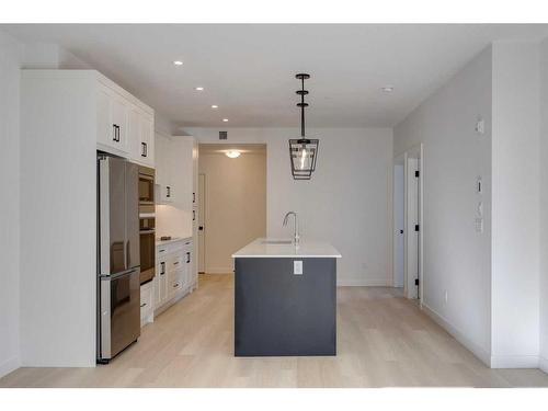 1301-55 Lucas Way Nw, Calgary, AB - Indoor Photo Showing Kitchen