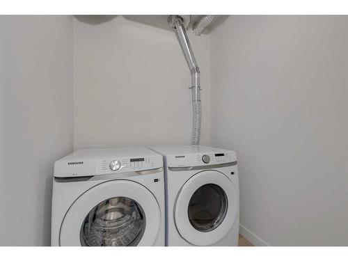 1301-55 Lucas Way Nw, Calgary, AB - Indoor Photo Showing Laundry Room