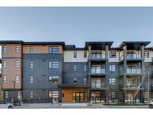 1301-55 Lucas Way Nw, Calgary, AB - Outdoor With Facade