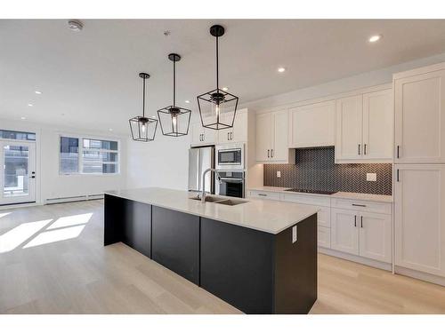 1301-55 Lucas Way Nw, Calgary, AB - Indoor Photo Showing Kitchen With Upgraded Kitchen