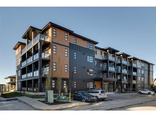 1301-55 Lucas Way Nw, Calgary, AB - Outdoor With Facade