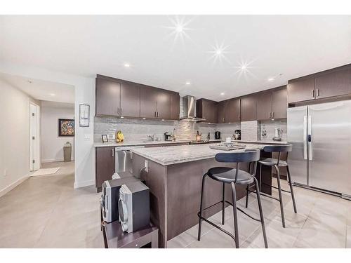 202-303 13 Avenue Sw, Calgary, AB - Indoor Photo Showing Kitchen With Stainless Steel Kitchen With Upgraded Kitchen