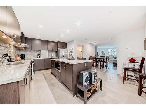 202-303 13 Avenue Sw, Calgary, AB - Indoor Photo Showing Kitchen With Upgraded Kitchen