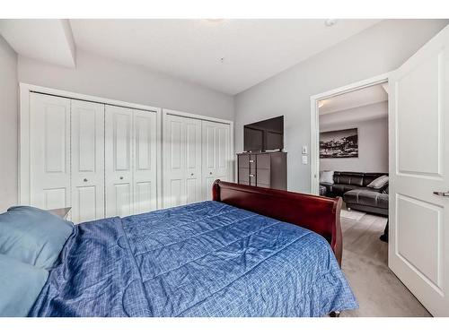 220-4350 Seton Drive Se, Calgary, AB - Indoor Photo Showing Bedroom