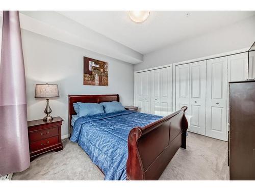 220-4350 Seton Drive Se, Calgary, AB - Indoor Photo Showing Bedroom