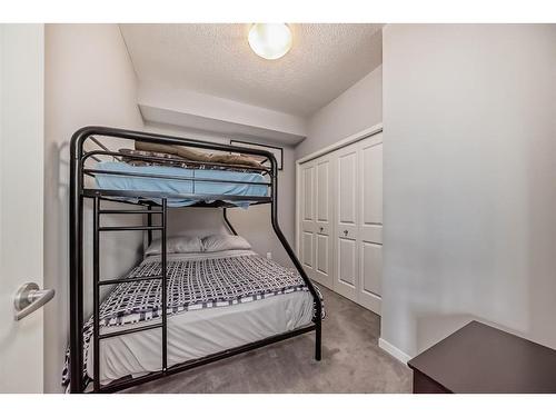 220-4350 Seton Drive Se, Calgary, AB - Indoor Photo Showing Bedroom