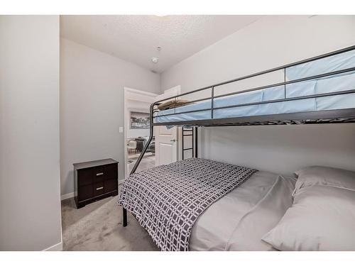 220-4350 Seton Drive Se, Calgary, AB - Indoor Photo Showing Bedroom