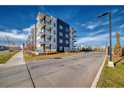 220-4350 Seton Drive Se, Calgary, AB - Outdoor With Balcony With Facade