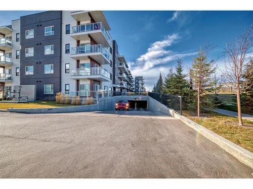 220-4350 Seton Drive Se, Calgary, AB - Outdoor With Balcony With Facade