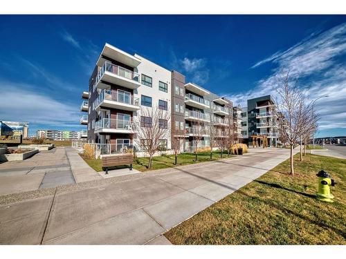 220-4350 Seton Drive Se, Calgary, AB - Outdoor With Balcony With Facade