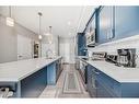 220-4350 Seton Drive Se, Calgary, AB  - Indoor Photo Showing Kitchen With Upgraded Kitchen 