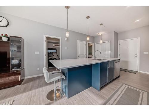 220-4350 Seton Drive Se, Calgary, AB - Indoor Photo Showing Kitchen With Upgraded Kitchen